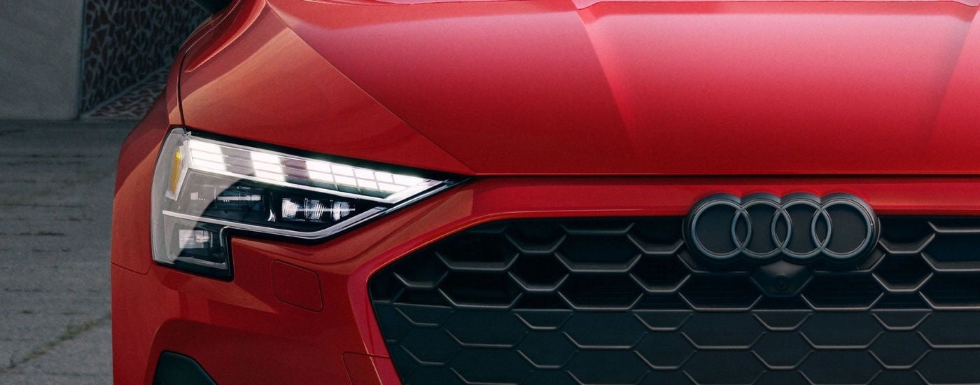 Passenger side headlight on a red 2025 Audi A3